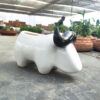 POC000308WT-a Charming ceramic buffalo planter, perfect for adding a playful touch to indoor décor with small plants or succulents.