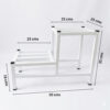 PS02MT0014c Two-tier white galvanised steel plant stand with slatted platforms and protective foot caps. Rust-resistant, powder-coated finish creates a stylish stepped display for indoor or outdoor greenery.